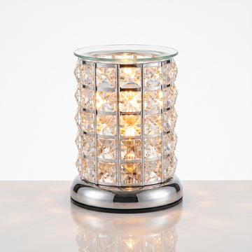 Clear crystal wax melter switched on and glowing