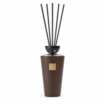 Oud Wood boutique reed diffuser with black reeds