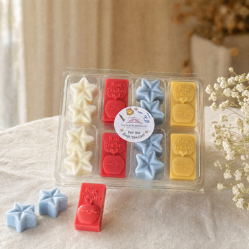 Teacher Mini Selection Wax Melt box styled on a table with loose melts