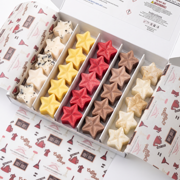 Close up of Coffee Shop wax melt stars in the tray
